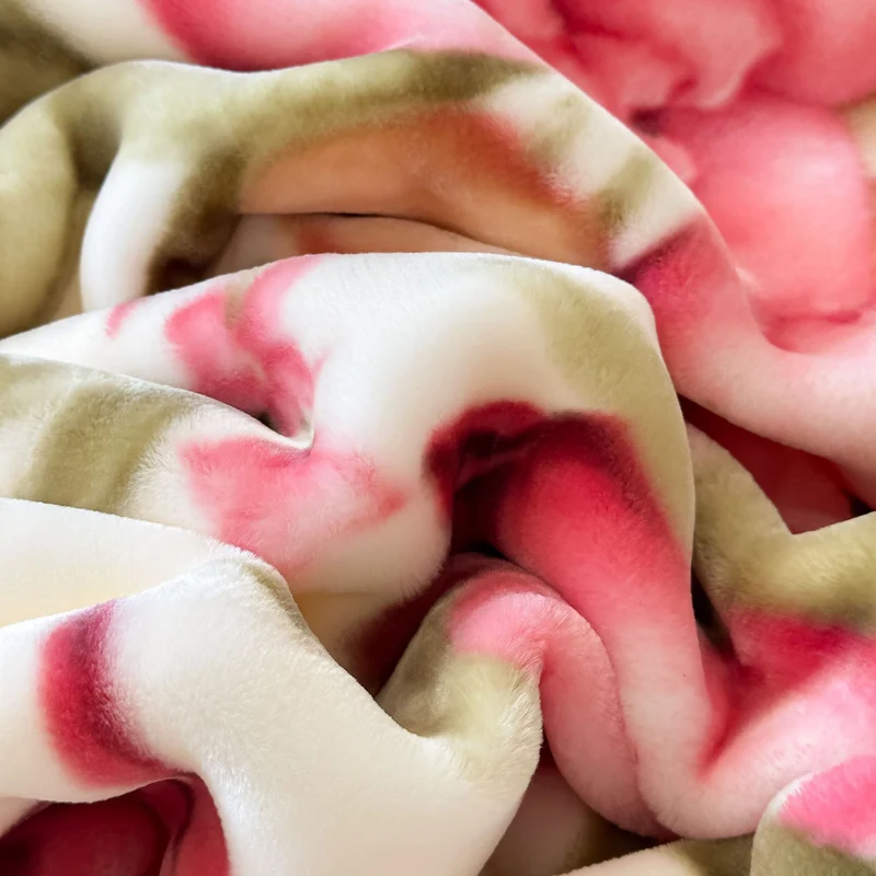 Blumengemusterte Fleece-Wurfdecke Karnz