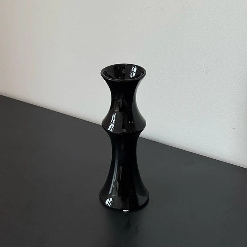 Glänzende skulpturale Sanduhrkeramikknopf mit ausgestelltem Rand