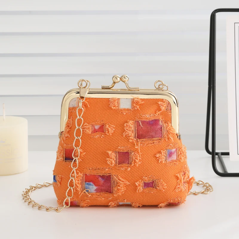 Vintage-inspirierte Stoff-Clutch