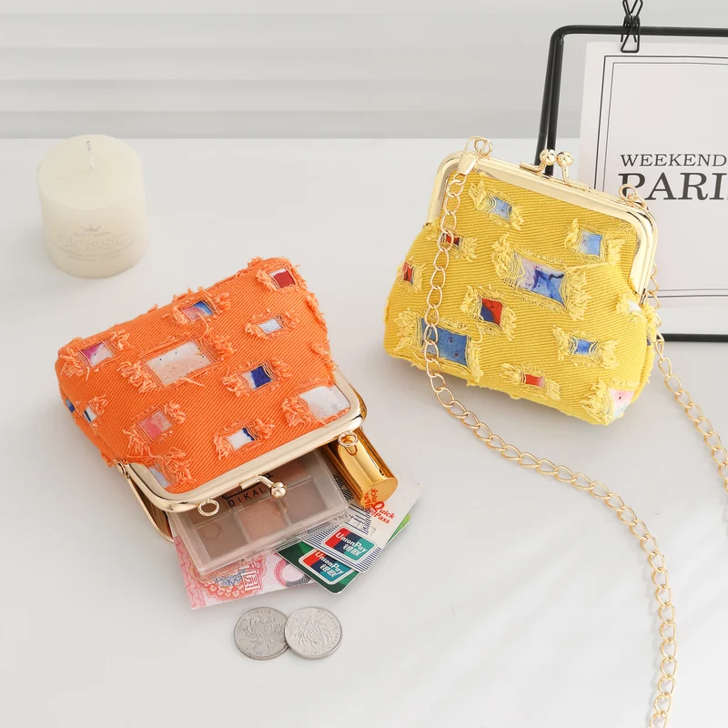 Vintage-inspirierte Stoff-Clutch
