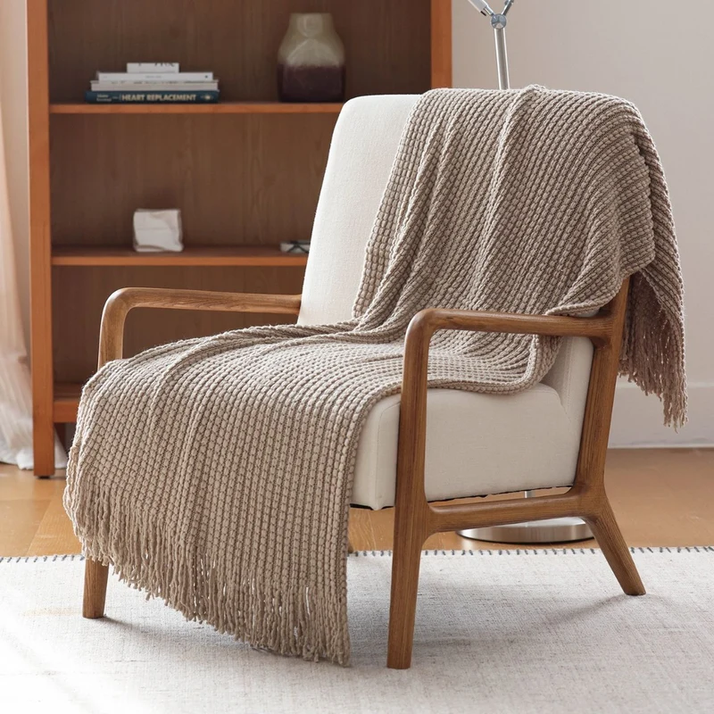Gemütliche Strickwurfdecke