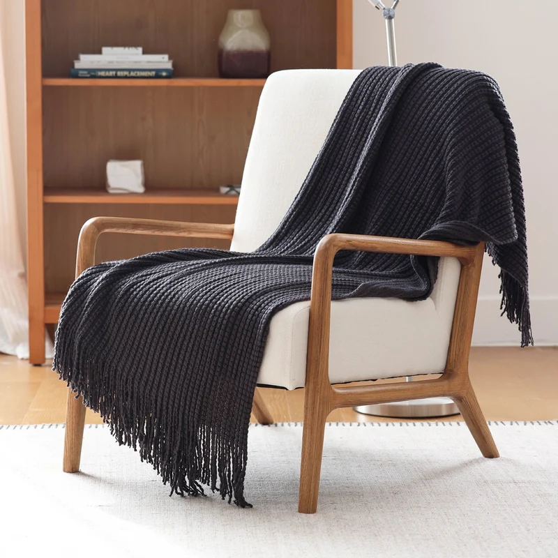 Gemütliche Strickwurfdecke