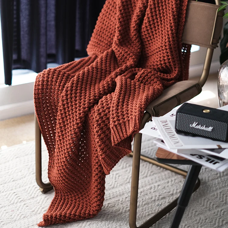 Gemütliche Strickwurfdecke