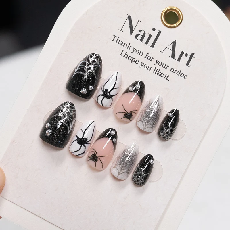 Künstlerische Press-On Nagelset mit Spinnen- und Netzdesign