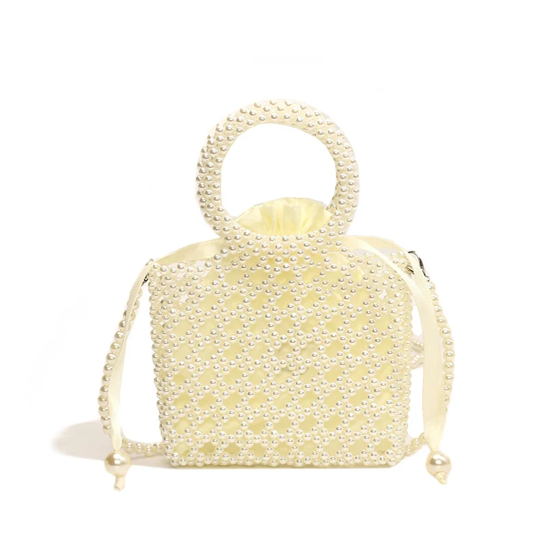 Elegante perlenverzierte Handtasche