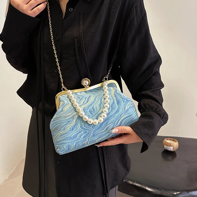 Elegante perlenverzierte Abendhandtasche