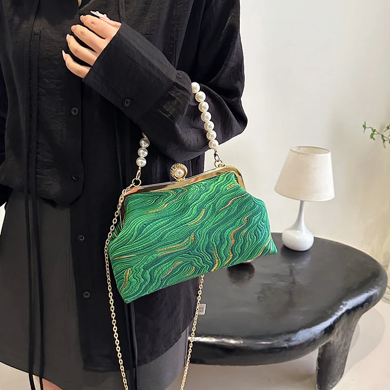 Elegante perlenverzierte Abendhandtasche