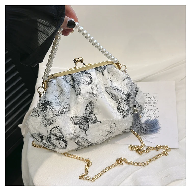 Elegante Clutch mit floralem Motiv
