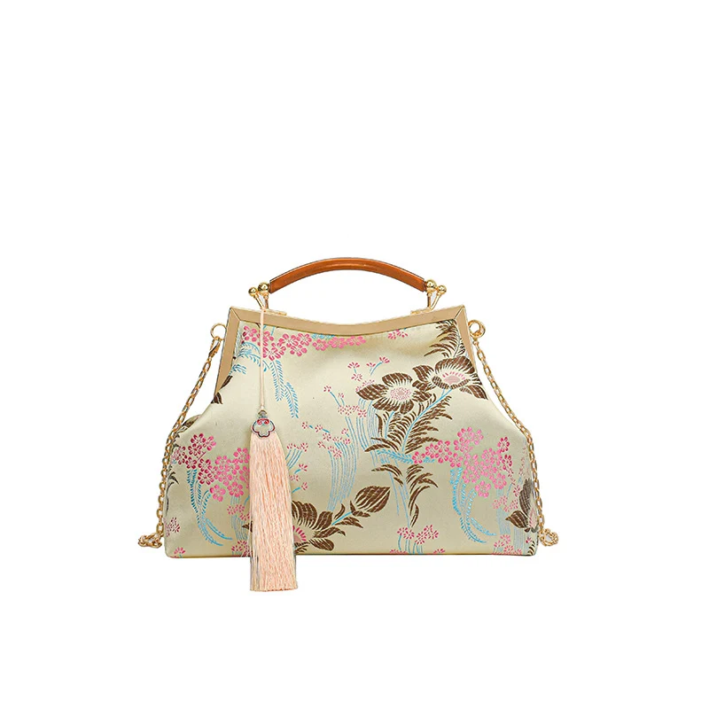 Elegante Blumenhandtasche
