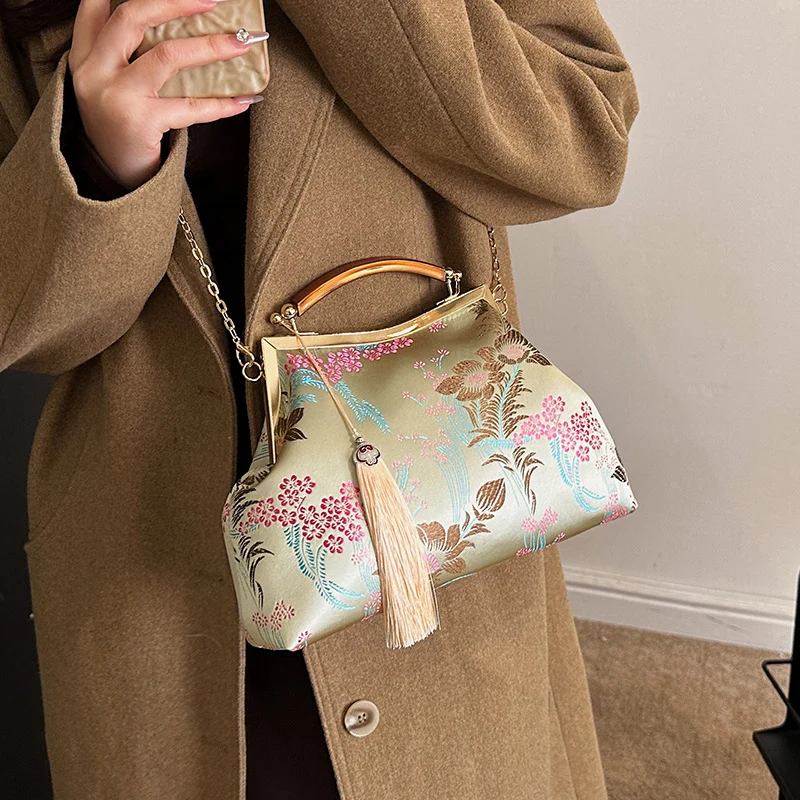 Elegante Blumenhandtasche