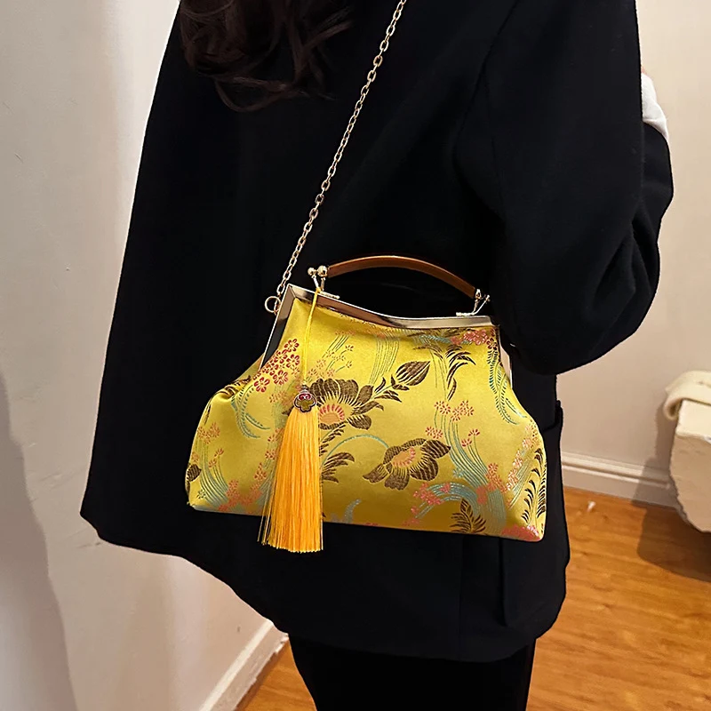 Elegante Blumenhandtasche