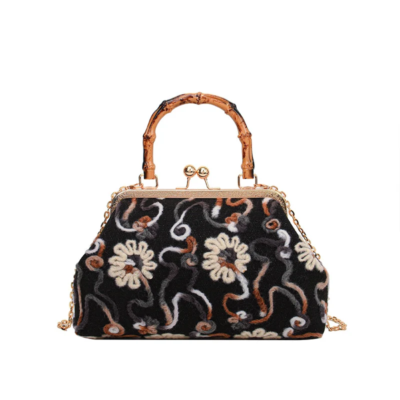 Elegante Blumenhandtasche