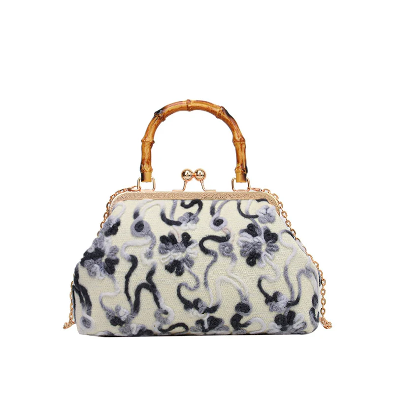 Elegante Blumenhandtasche