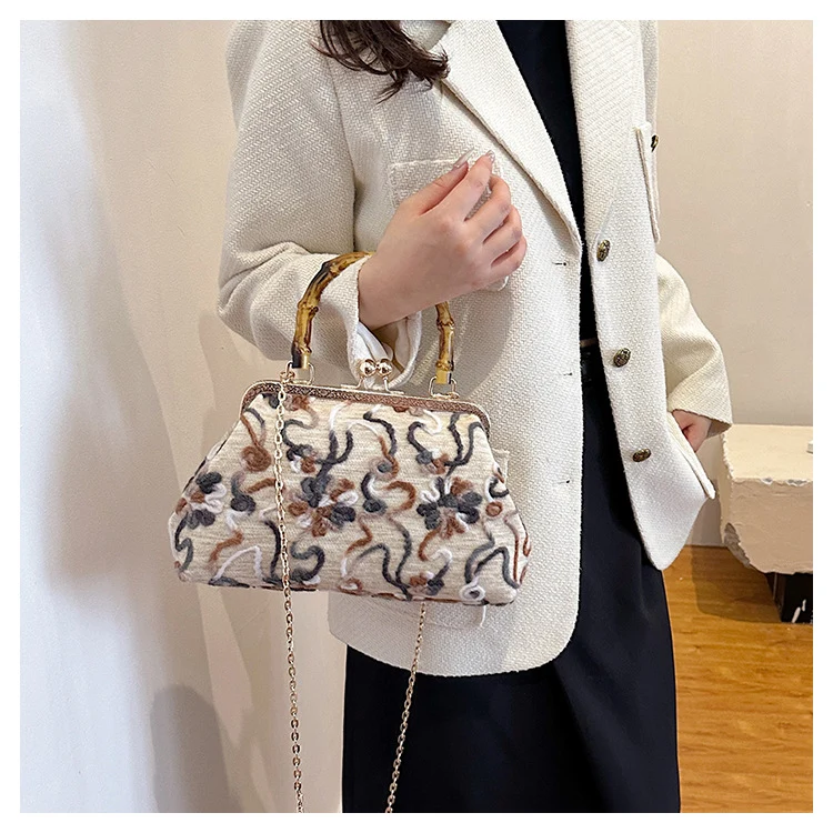 Elegante Blumenhandtasche