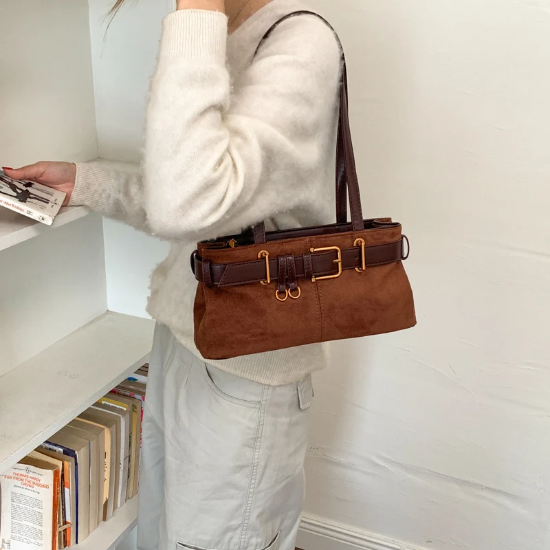 Elegante Wildlederhandtasche