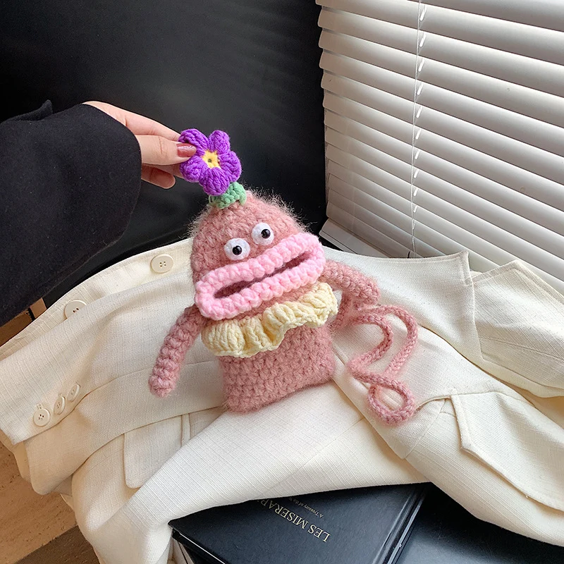 Niedliche gehäkelte Charakter-Handtasche