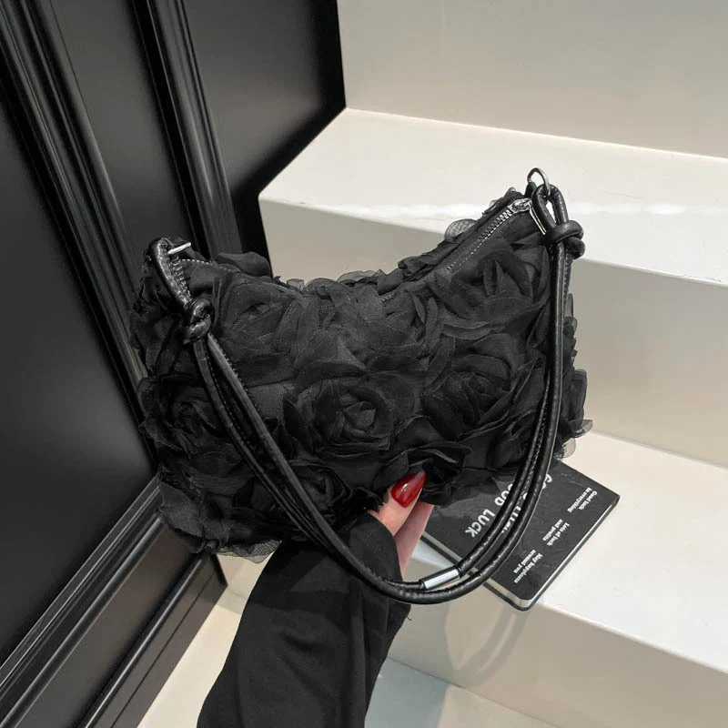 Blumenverzierte Handtasche