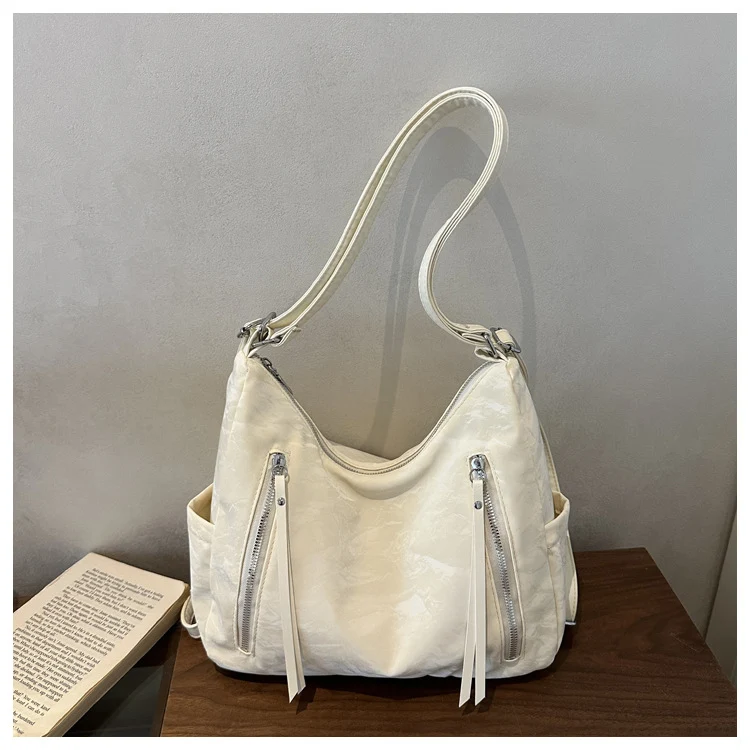 Modische gesteppte Handtasche