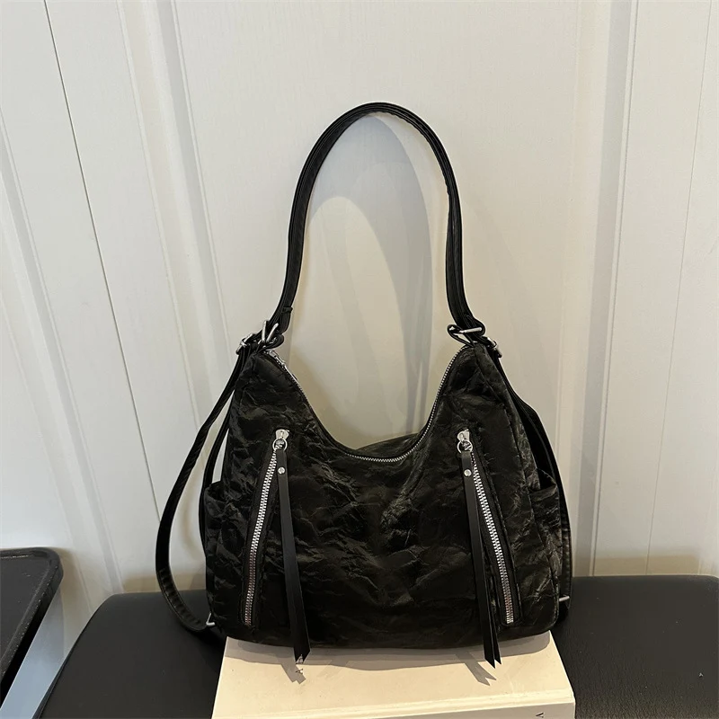 Modische gesteppte Handtasche