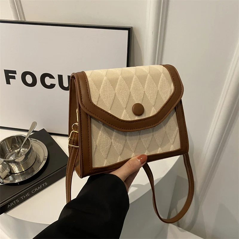 Elegante gesteppte Handtasche mit Schulterriemen