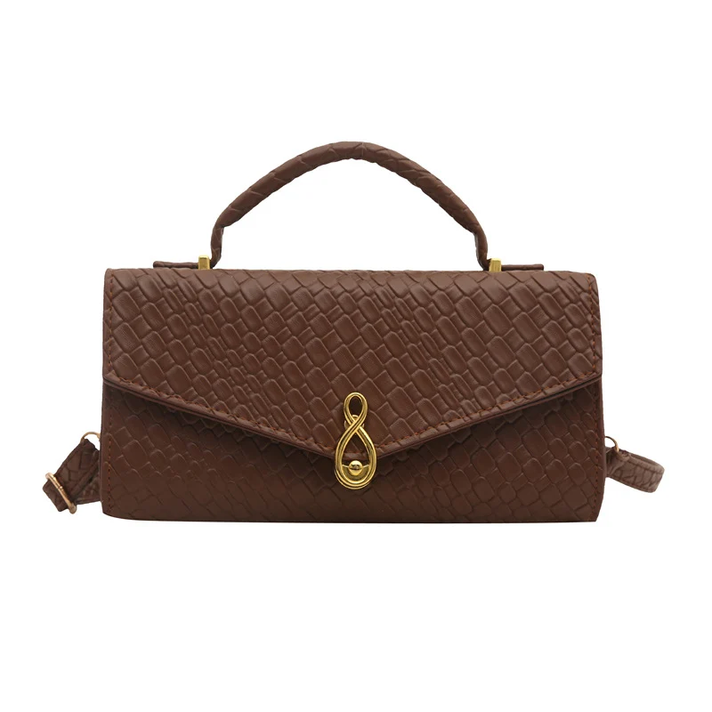 Elegante Handtasche im Krokodil-Muster