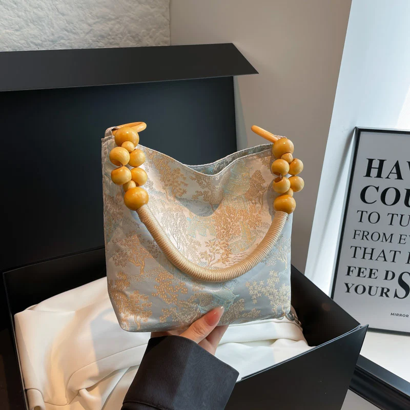 Elegante Handtasche mit Bambusgriff