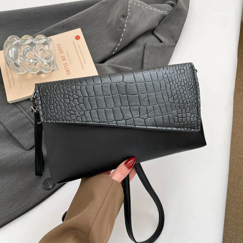 Croc-Prägung Clutch-Handtasche