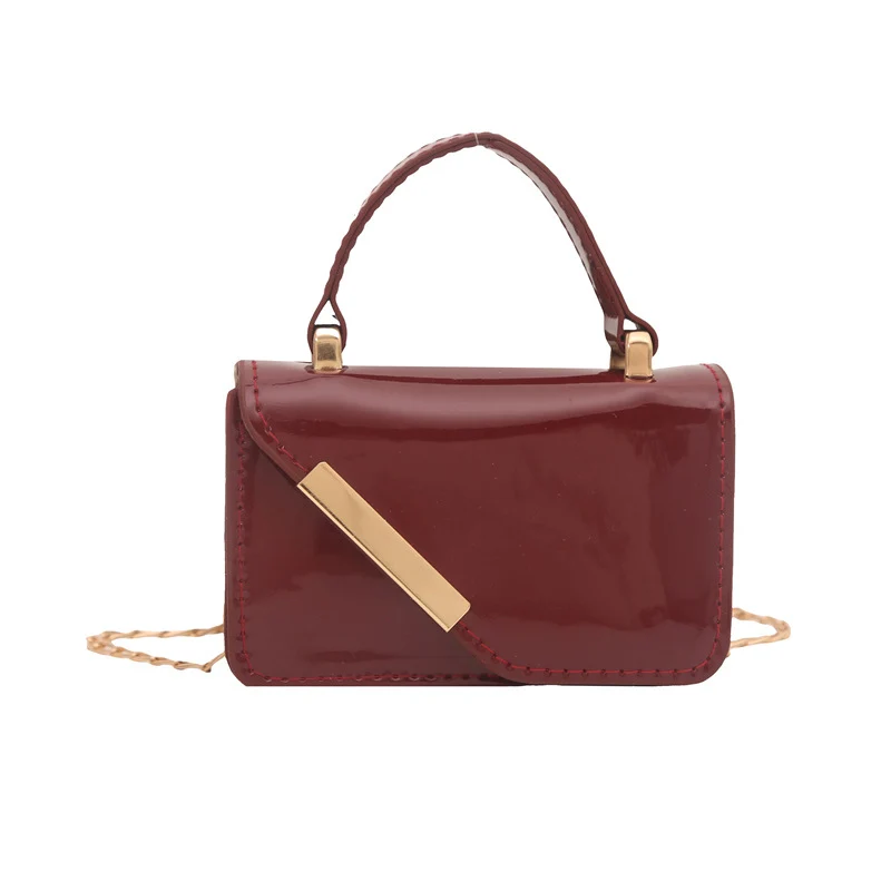 Elegante Handtasche aus patentiertem Leder