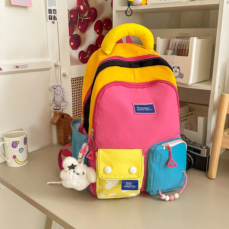 Bunter Mehrfach-Taschen Rucksack Karnz