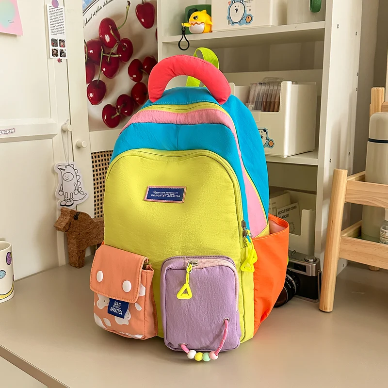 Bunter Mehrfach-Taschen Rucksack Karnz