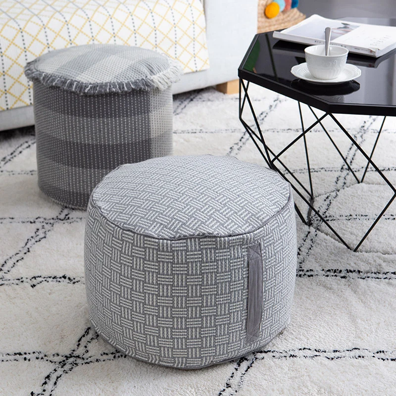 Gepolsterter Pouf Sitzhocker mit gewebter Struktur und Tragegriff
