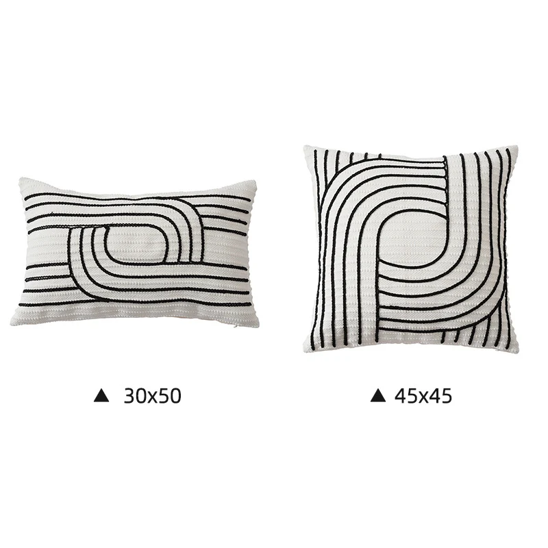 Dekokissenbezug mit strukturierter Stickerei und geometrischem Linienmotiv