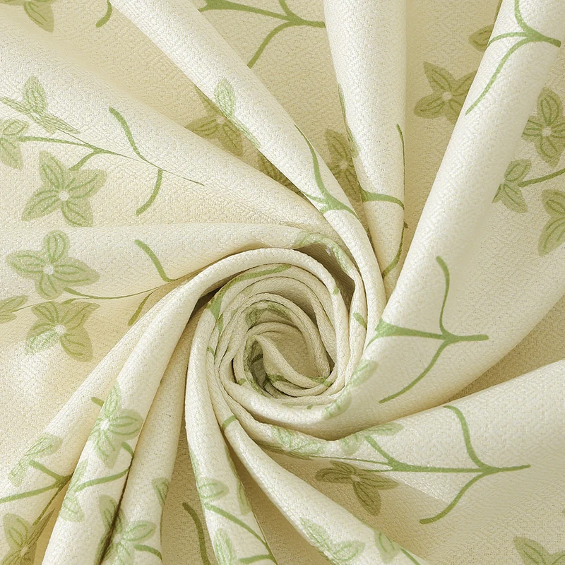 Baumwollmix‑Tischdecke mit eingewebtem Blumenbordüren‑Dekor und grünem Saum