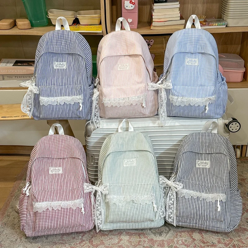 Charmantes gestreiftes Rucksack mit Spitzenbesatz Karnz