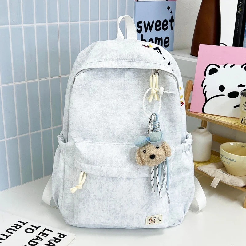Lässiger weicher Stoff Rucksack mit süßem Charm Karnz