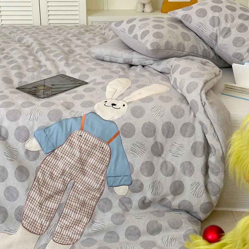 Kinder-Steppbett-Garnitur mit appliziertem Hunde-Motiv und Tupfenmuster