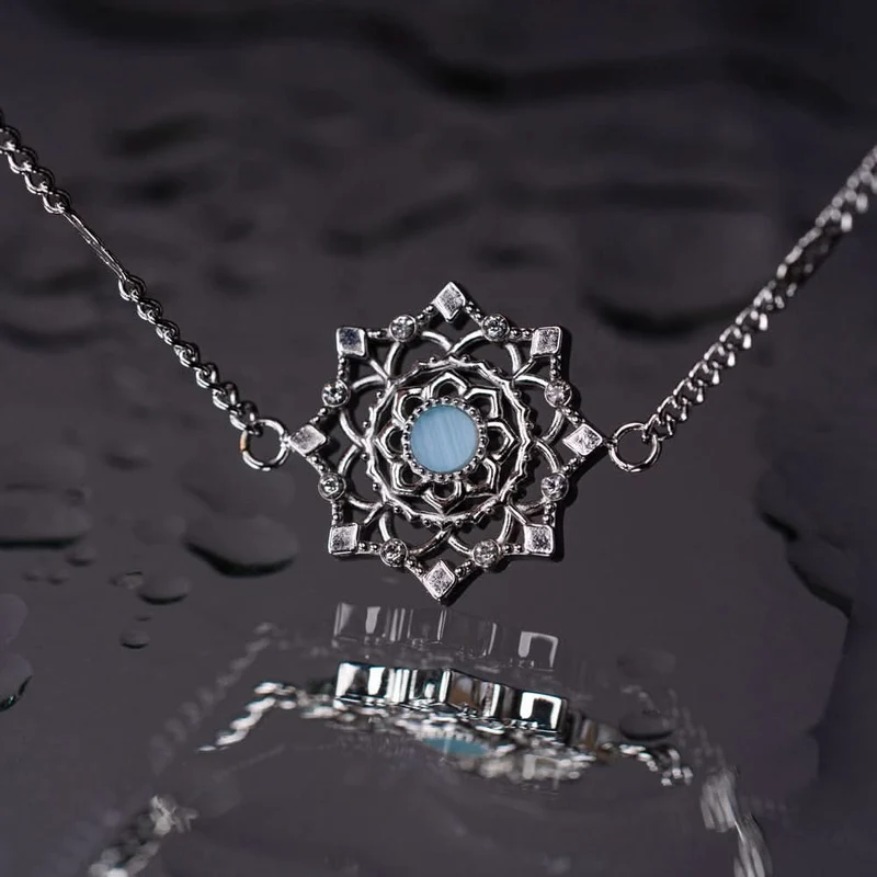 Aphonia Armband mit Schneeflocken Anhänger - Holzkern Modell: Jewelry