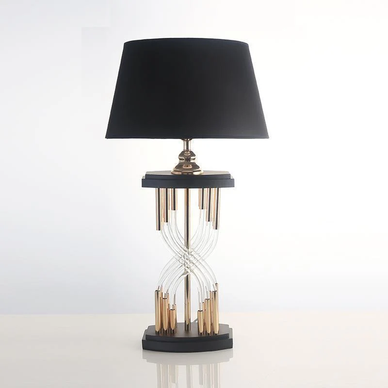 Moderne dekorative Tischlampe mit skulpturaler Basis