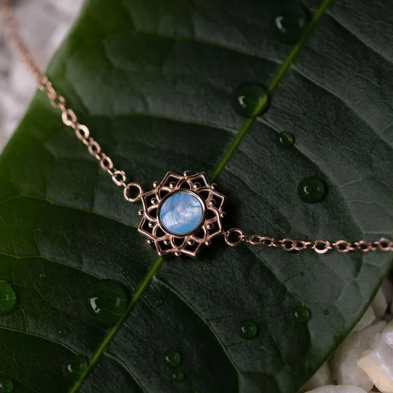 Composition Armband mit blauem Perlmutt Anhänger - Holzkern Modell: Jewelry