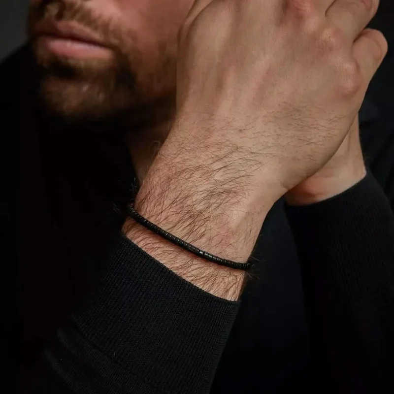 Schwarzes Armband aus scheibenförmigem Blackstone mit Edelstahlverschluss - Rebel&Rose Modell: RR-40073-S-M