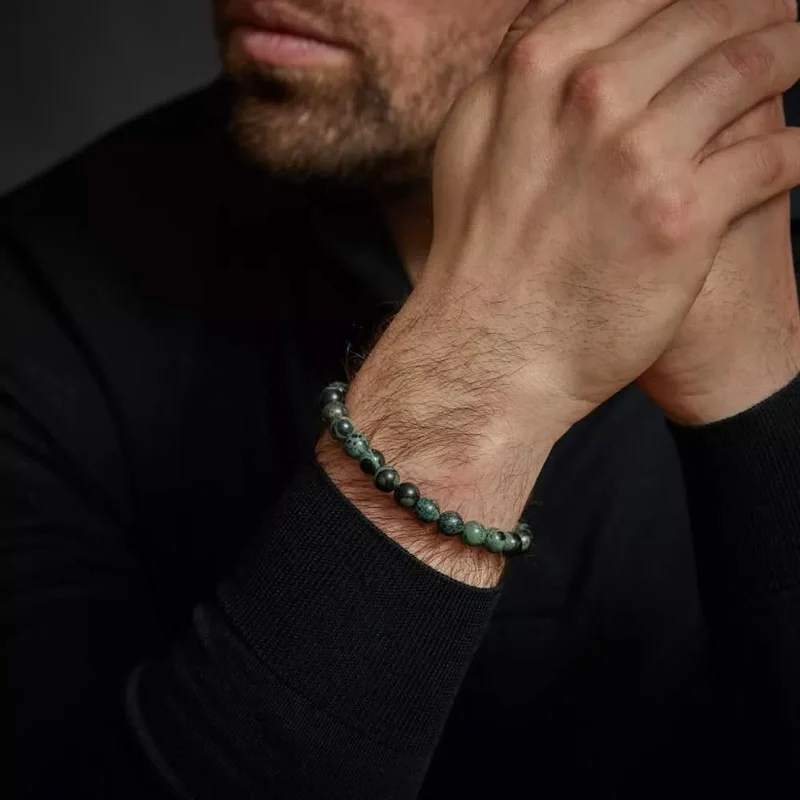 Armband aus 8mm großen Rhyolithsteinen mit Metallverschluss - Rebel&Rose Modell: RR-80107-S-L