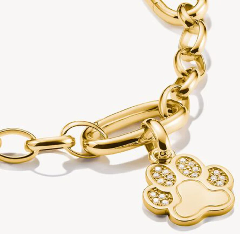 Charm-Anhänger, Pfote mit weißen Edelsteinen, aus Silber, vergoldet - Thomas Sabo Modell: CC1259-414-14