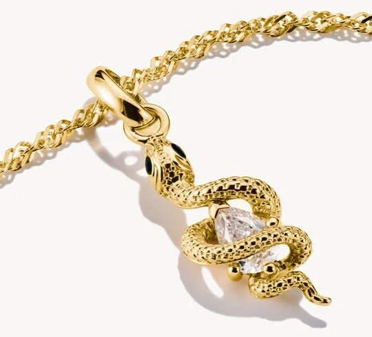 Thomas Sabo Charm-Anhänger, Schlange mit weißem Edelstein, aus Silber, vergoldet
