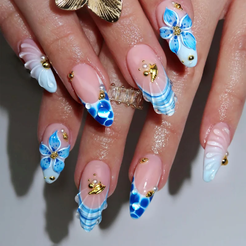 Dekorativer Press-On Nagelset mit ozean-inspiriertem Ästhetik