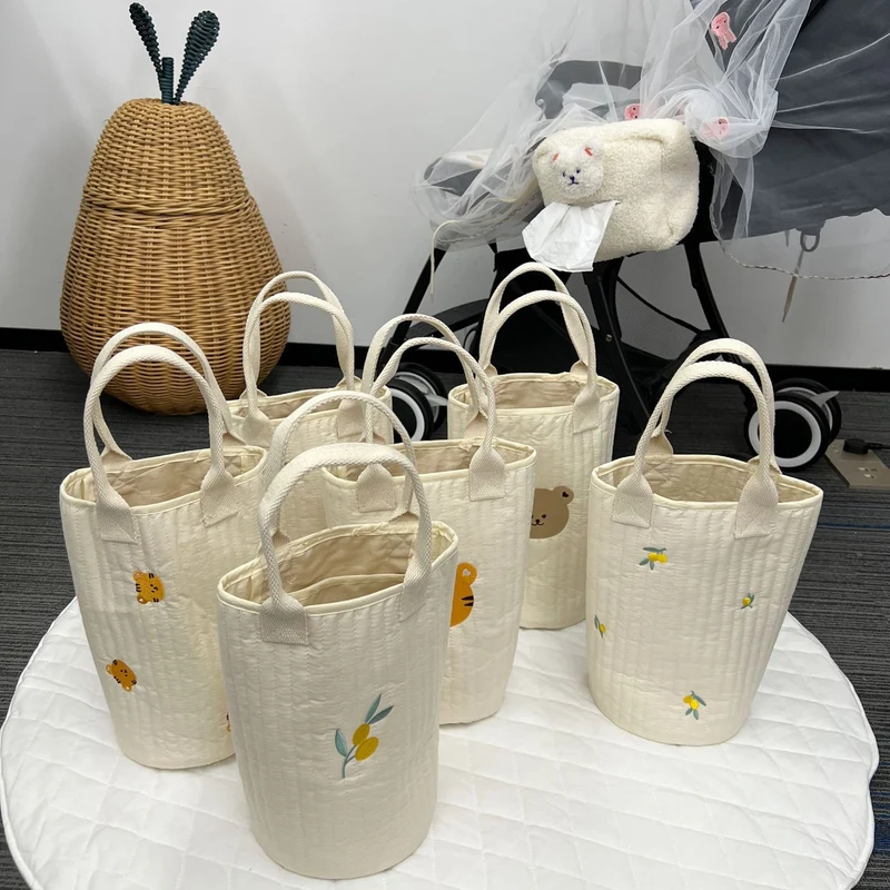 Ge quiltete Baumwoll-Canvas-Tasche mit besticktem Zitronenmuster und kurzen Webbandgriffen