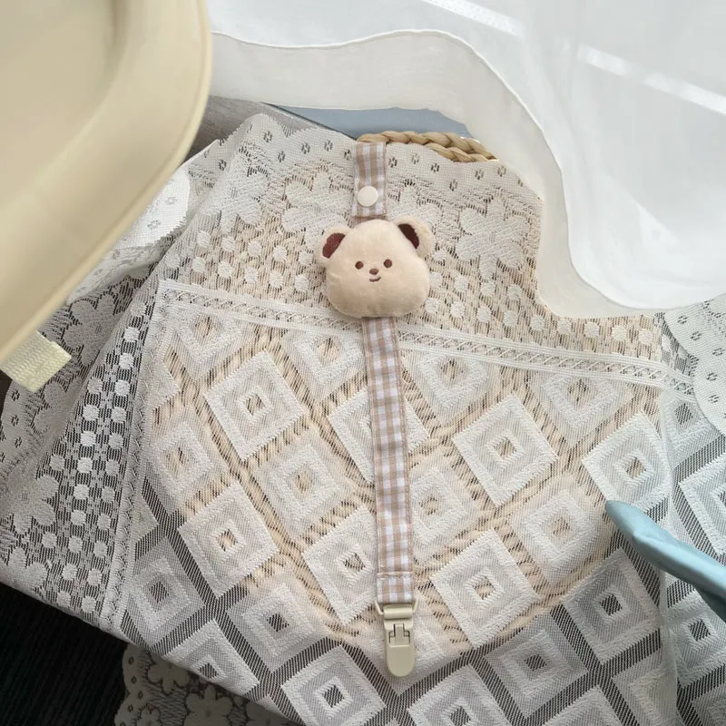 Blumenkleidungs-Schnullerclip mit Gingham-Baumwollgurt