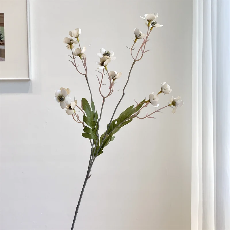 Dekorativer künstlicher Blumenzweig