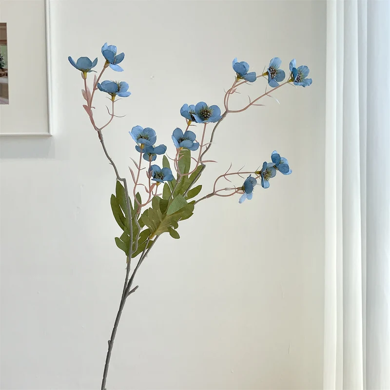 Dekorativer künstlicher Blumenzweig