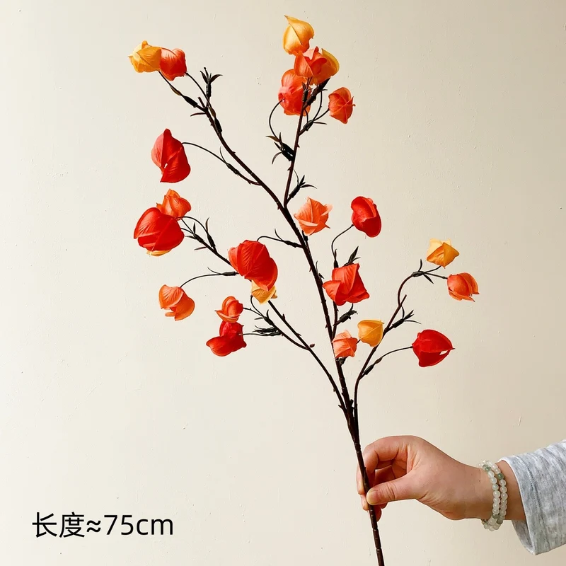 Dekorative Blumenast für die Hauseinrichtung