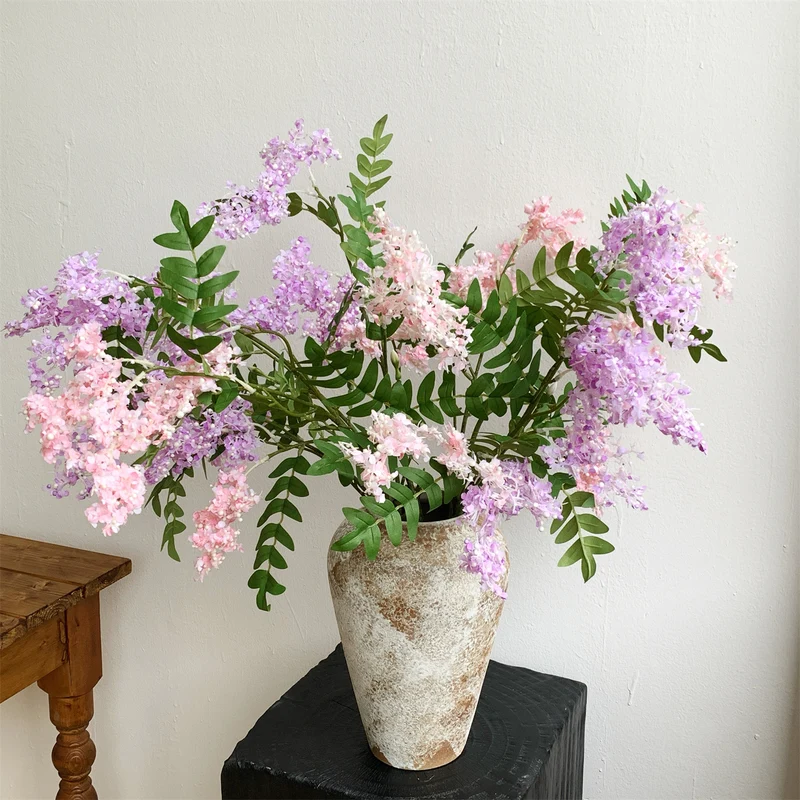 Dekoratives Faux Blumenstrauß
